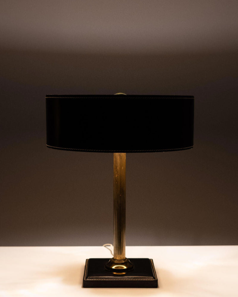 Jacques Adnet black leather clad table lamp with brass column