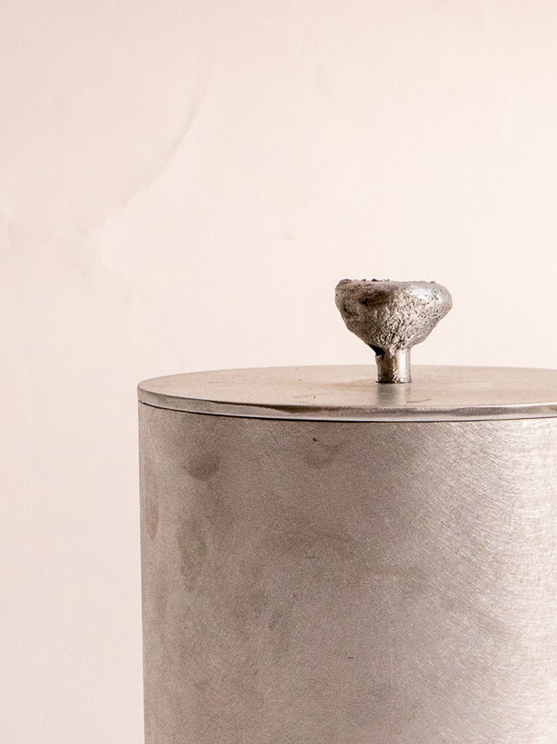 Contemporary ceramic bin with sculptural stone knob detail