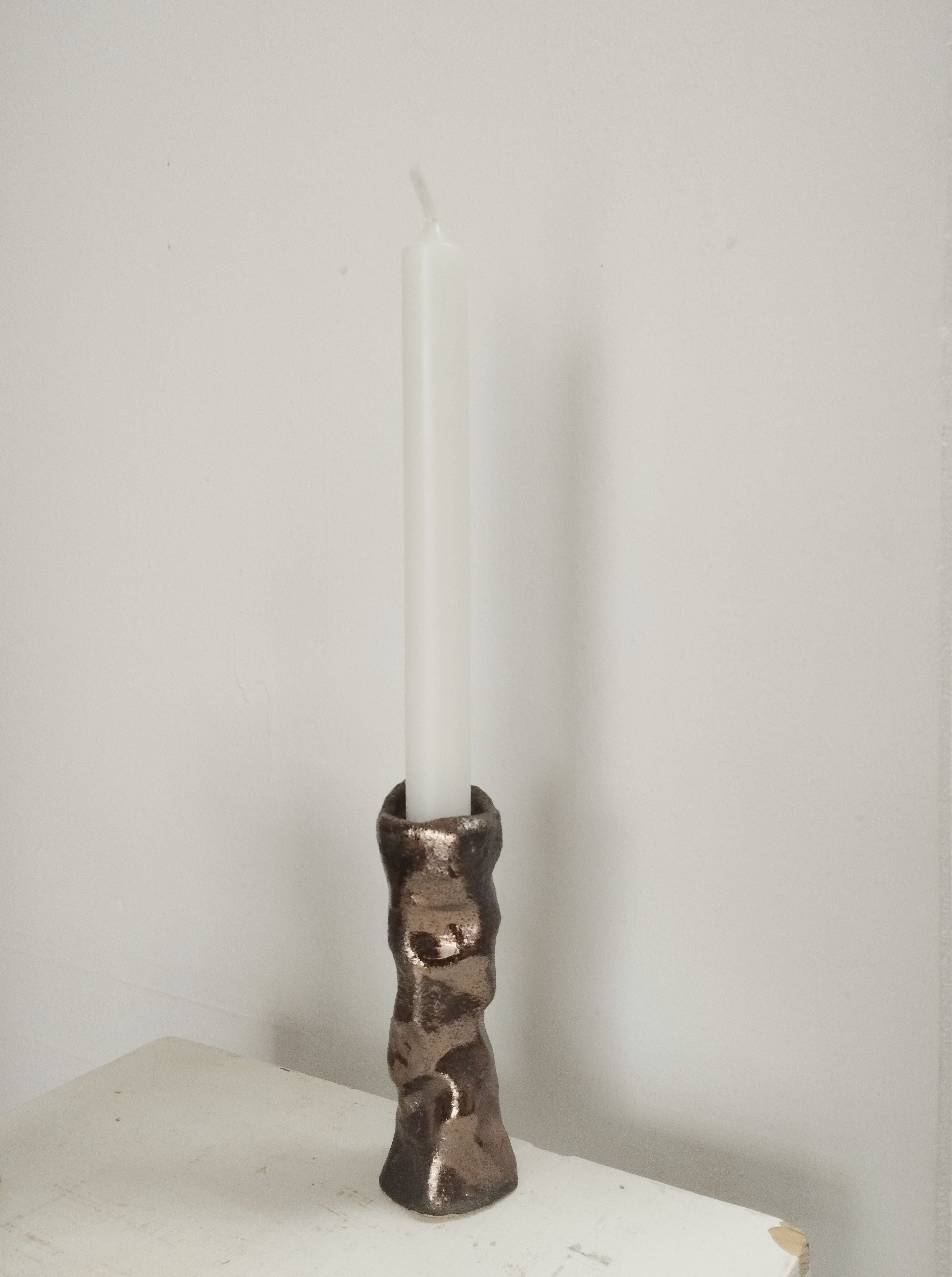 Candleholder made of sandstone and bronze enamel, perfect for home decor