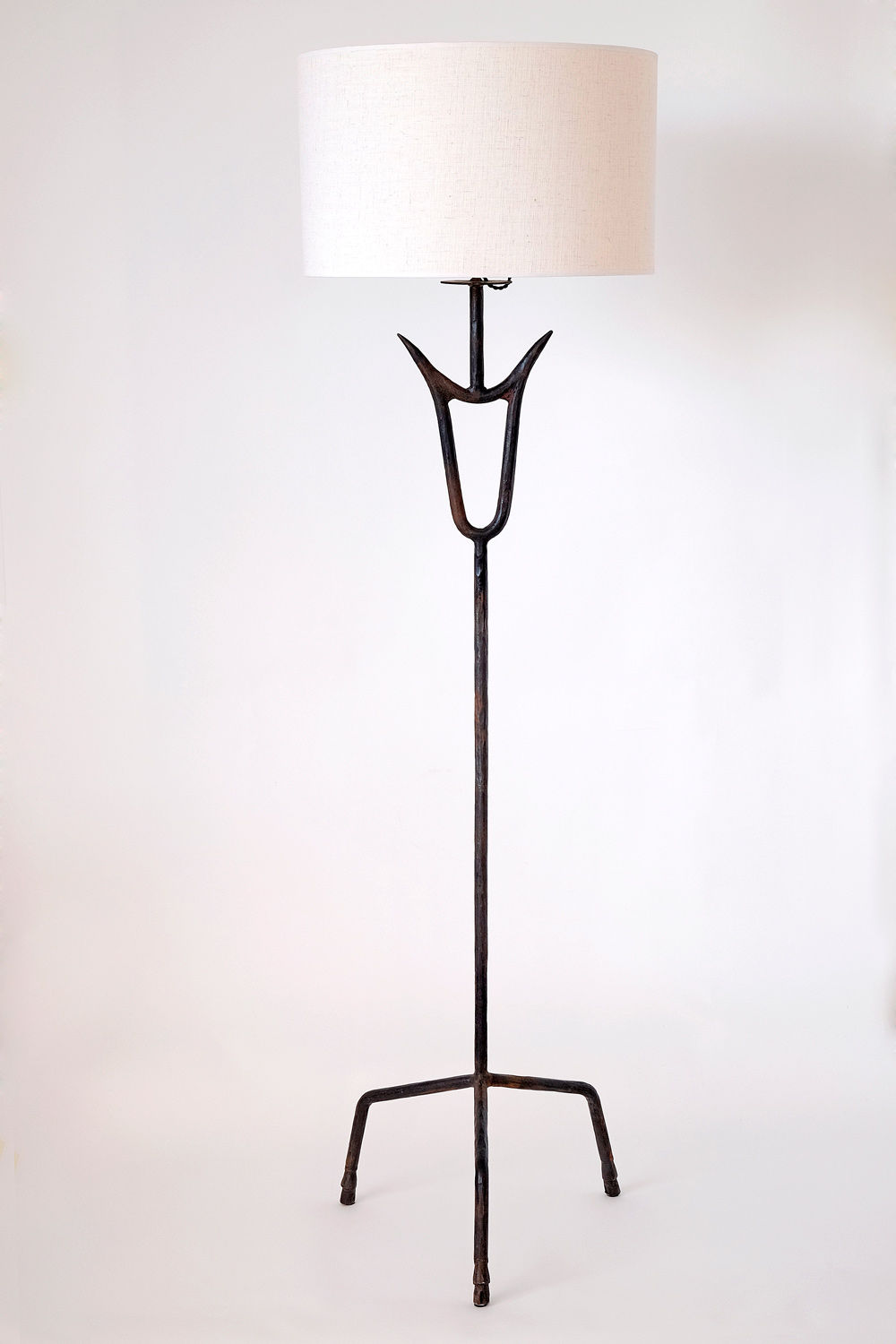 Sevilla Lamp with elegant curved base and white fabric shade