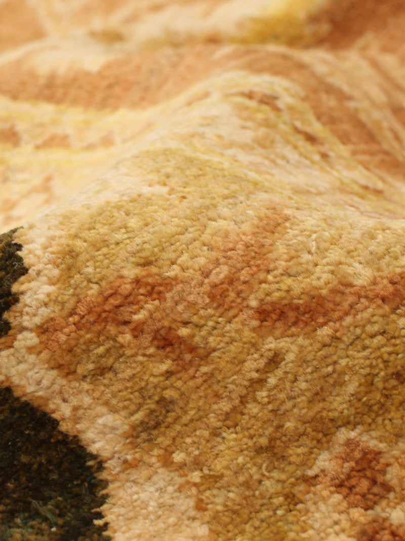 Close-up of the Chobi Rug in Ardor (239 x 292 cm) by catalog:three, featuring a textured wool surface in warm yellow, orange, and brown tones with soft, raised wavy patterns.