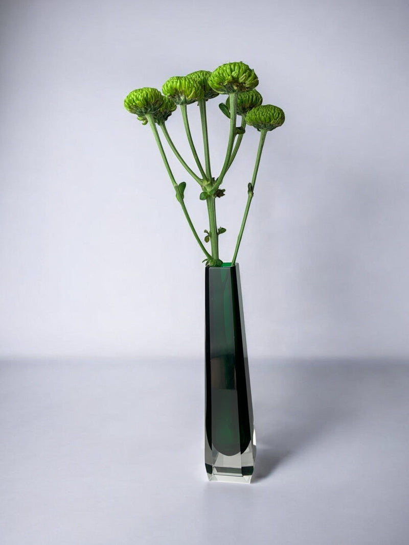 Green Sommerso Murano glass vase with ranunculus flowers display