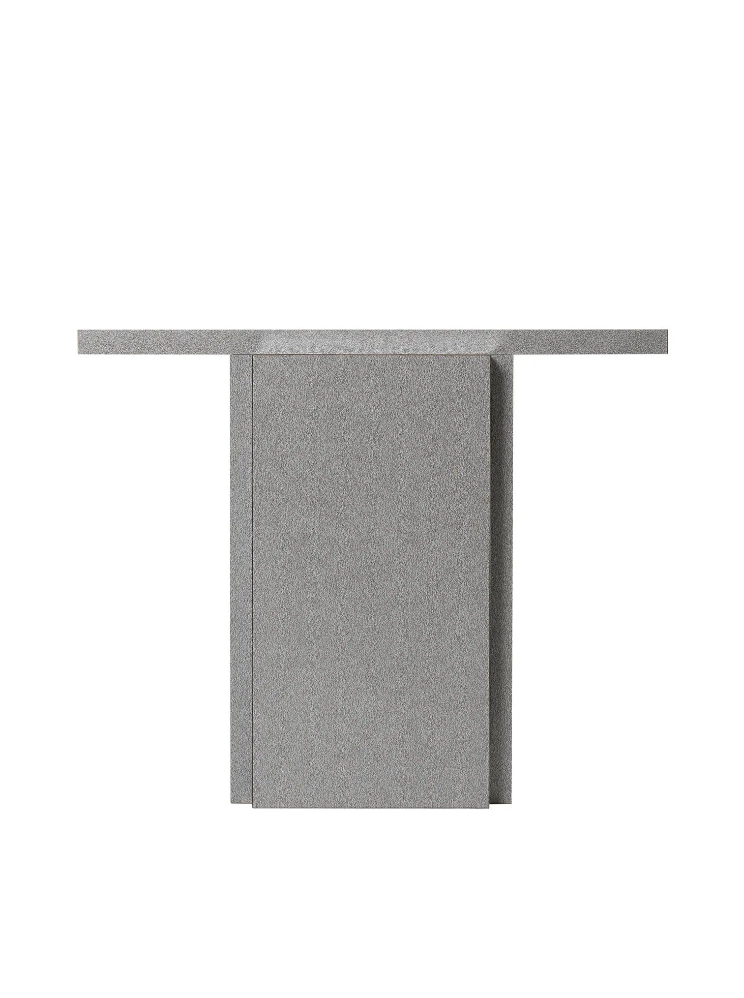 Introducing the "Mara T" Side Table – Silver Noise by TEGET, featuring a minimalist design with clean, angular lines and a central rectangular base. The table's top is a sleek, extended surface that enhances its contemporary aesthetic.