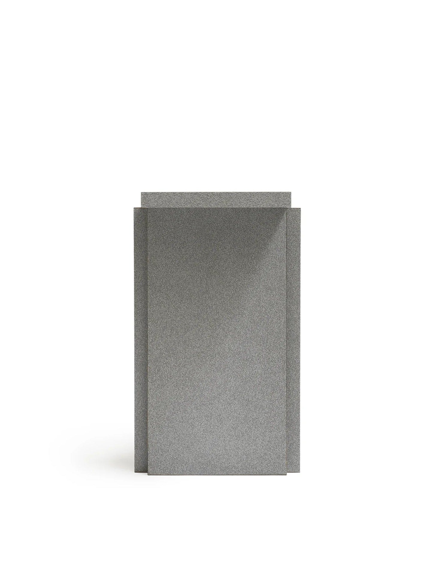 The "Mara T" Side Table – Silver Noise by TEGET, featuring a minimalist, gray rectangular design with a slightly textured surface, stands against a plain white background. Its layered design mimics laminated furniture, creating shadows that give it a three-dimensional appearance.