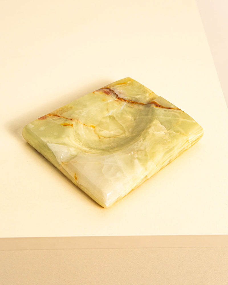 Italian onyx ashtray with natural veining and square form