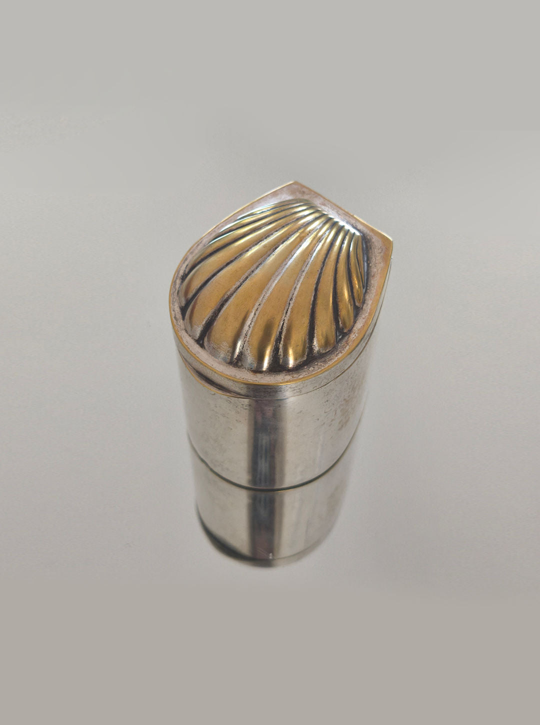 Silver shell-shaped decorative box with patina finish detail