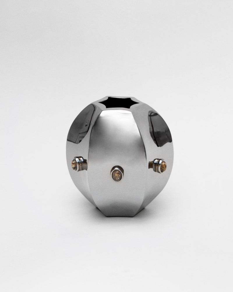 Evi titanium vase with angular faceted design by Hein Studio
