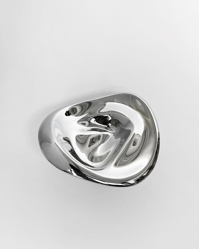 Ripple titanium wall hook with fluid sculptural form by Hein Studio