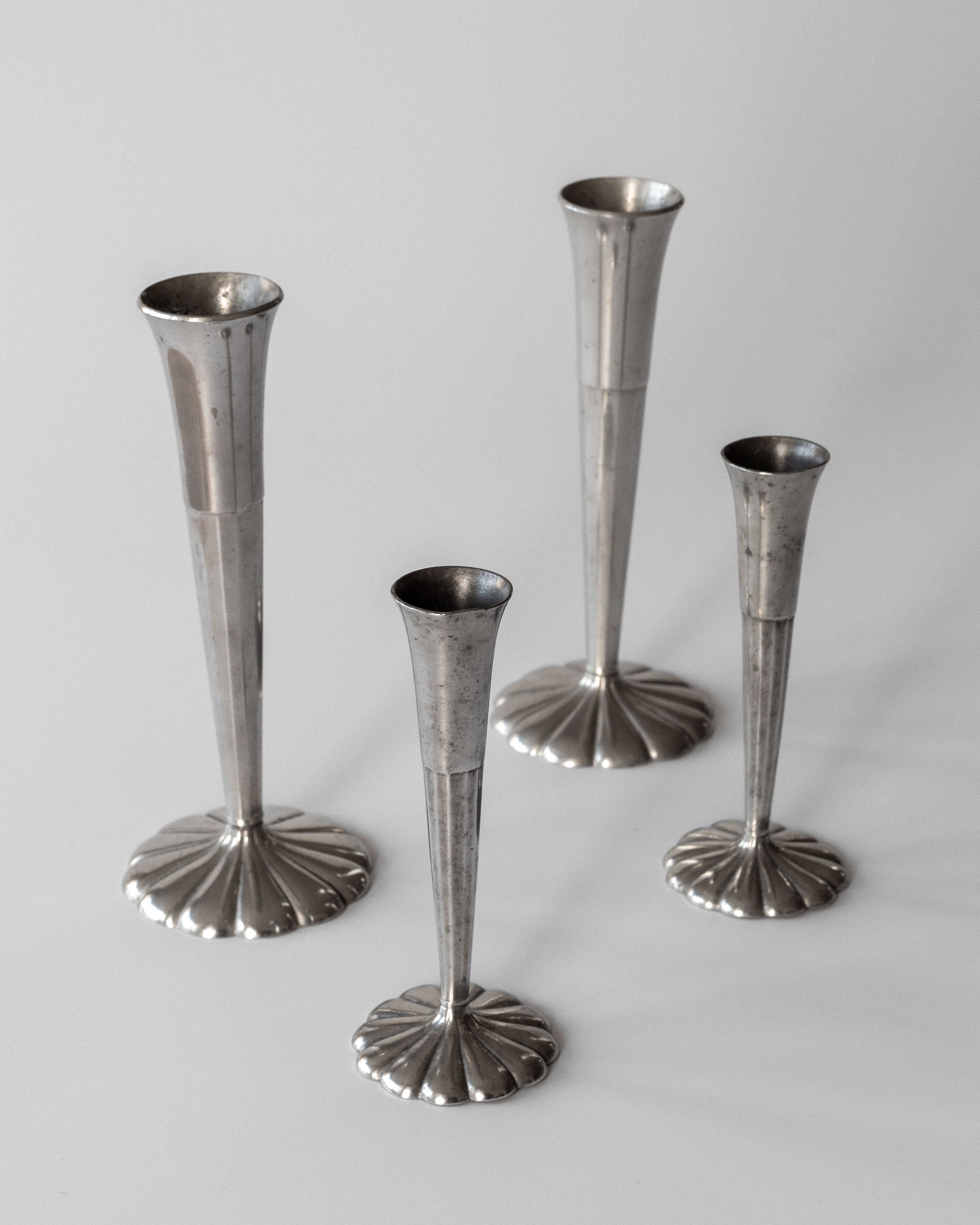 Set of Four Art Deco Metal Vases