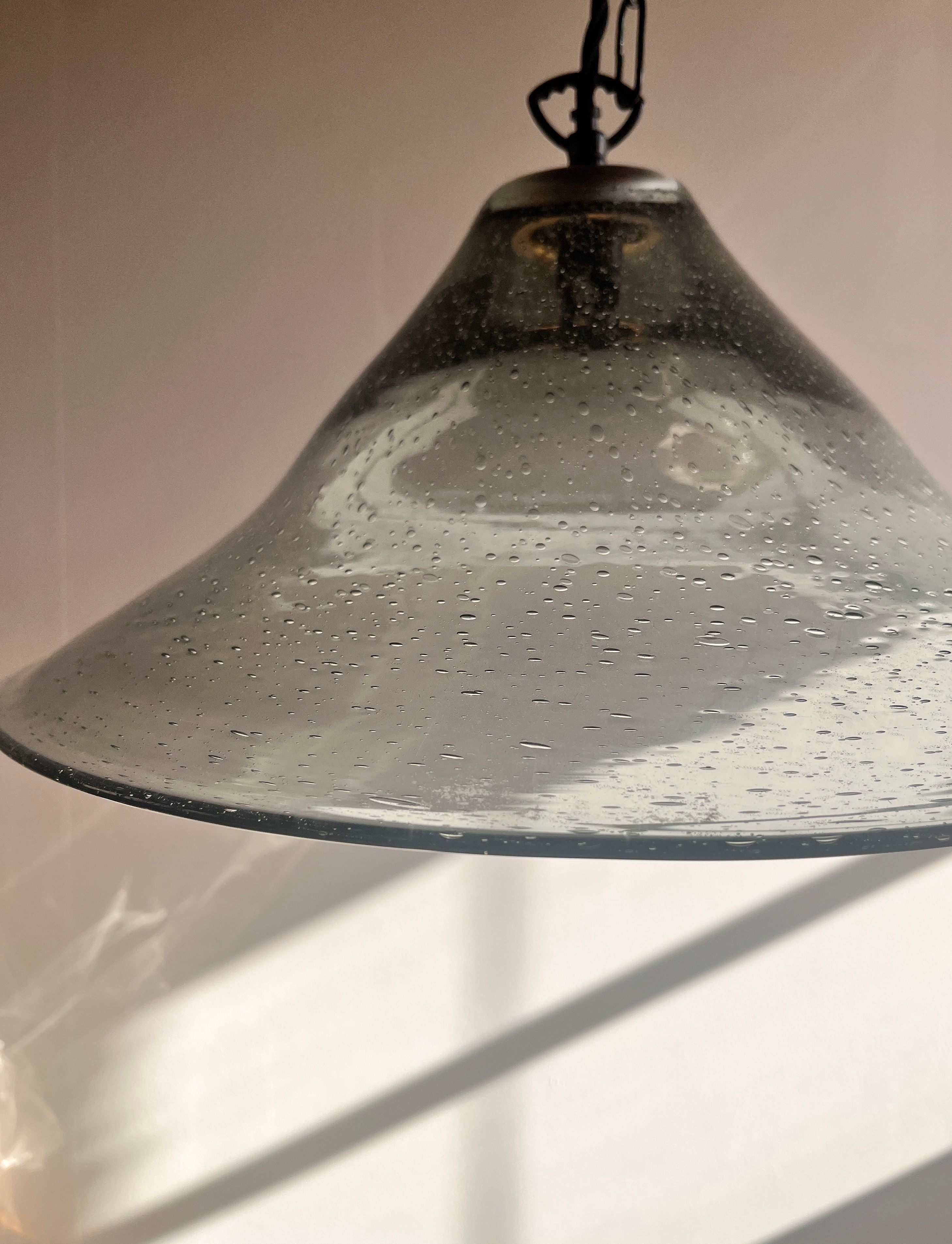 Seeded glass bell pendant lamp with bubble texture detail