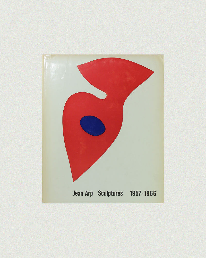 Jean Arp Sculptures 1957-1966 art book cover with red biomorphic form