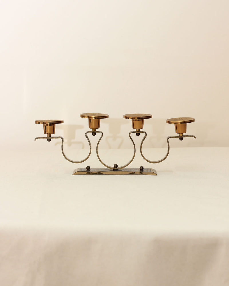 Vintage brass four-candle holder with curved arms, 1960s design