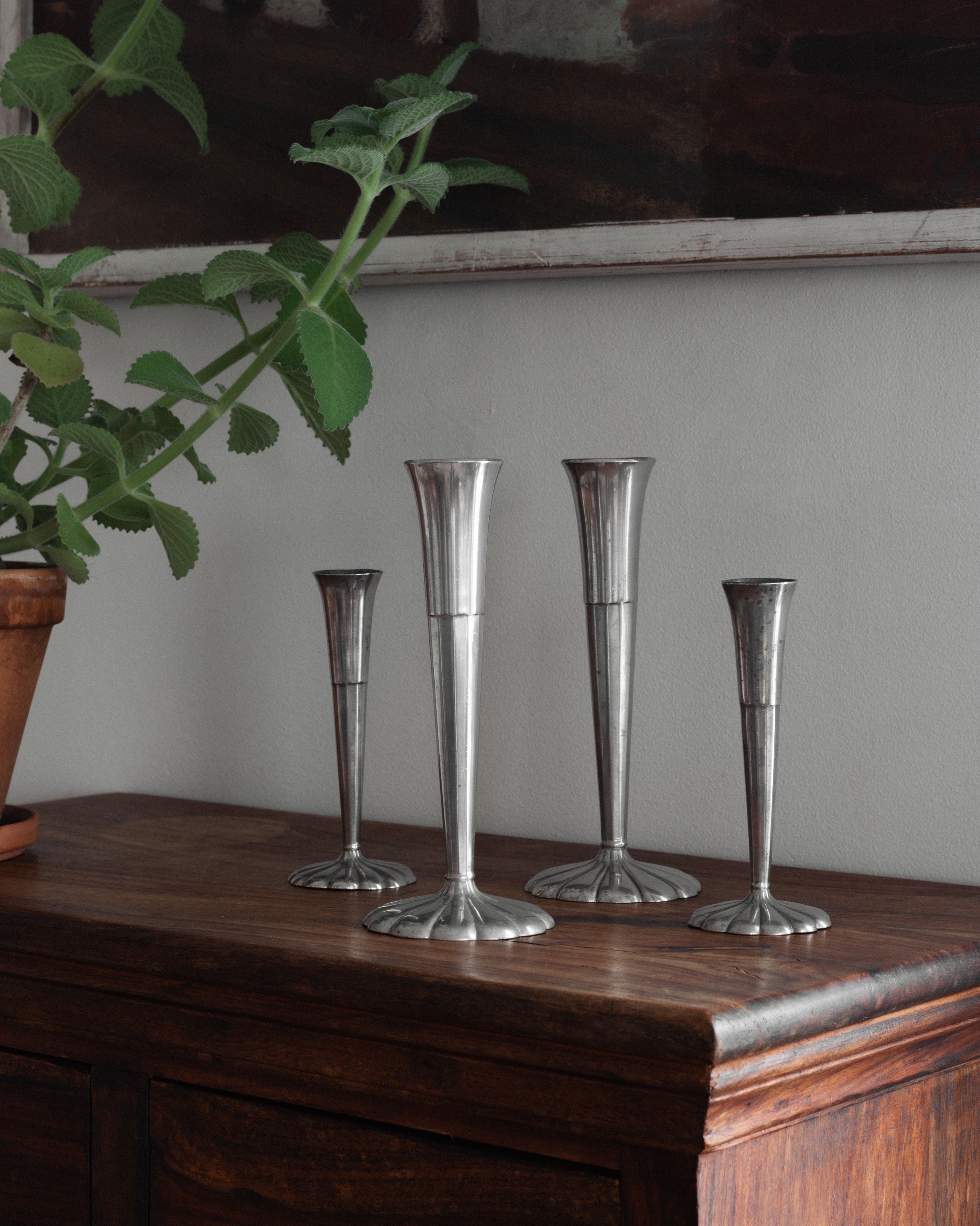 Set of Four Art Deco Metal Vases