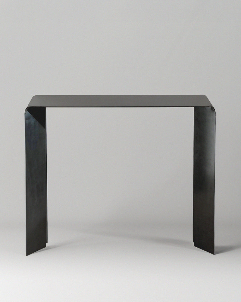 Hiro steel console table profile view showing minimalist design