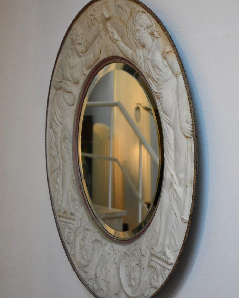 Round Embossed Metal Sheet Mirror, 1910s.