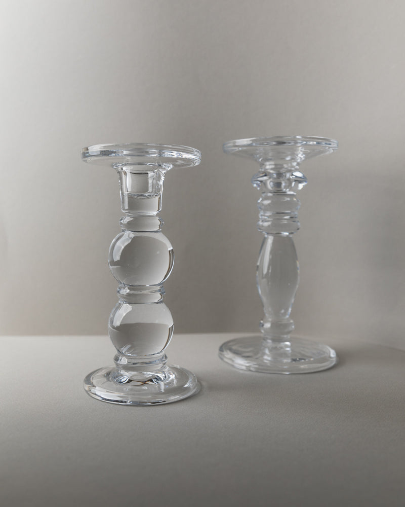 Pair of clear glass Italian candlesticks with sculptural stems