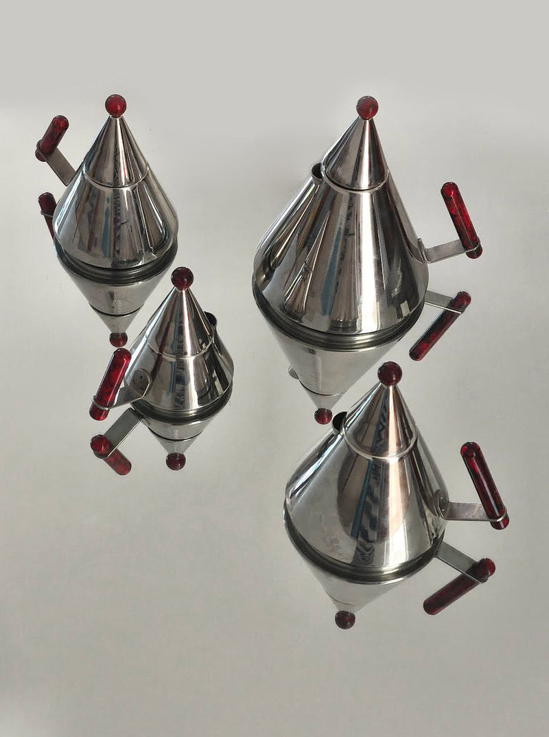 Memphis style chrome tea set with conical spouts and red accents
