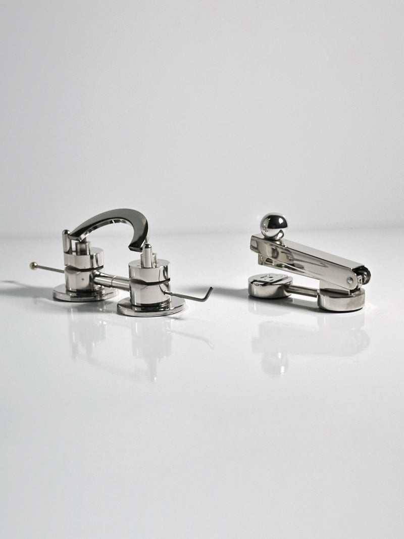 Chrome Art Deco desk set with curved faucet-style lamp and accessories