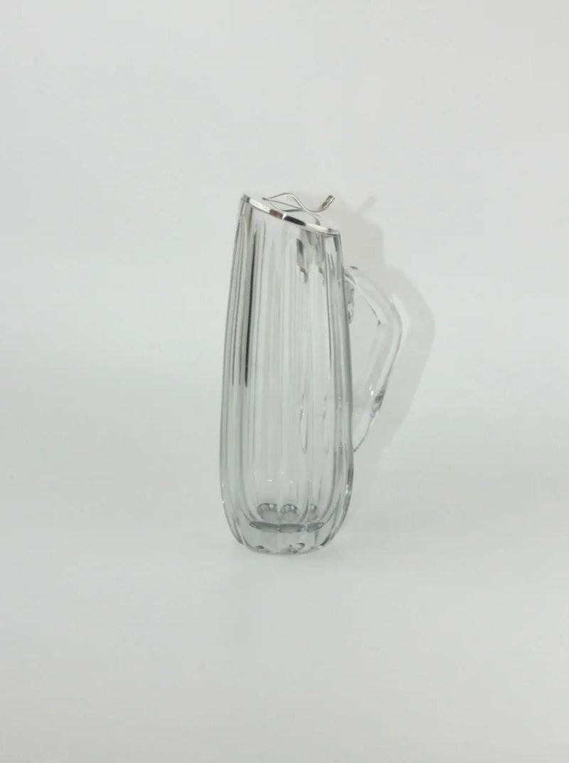  Luxurious crystal decanter with a sleek and modern shape, perfect for serving fine wines
