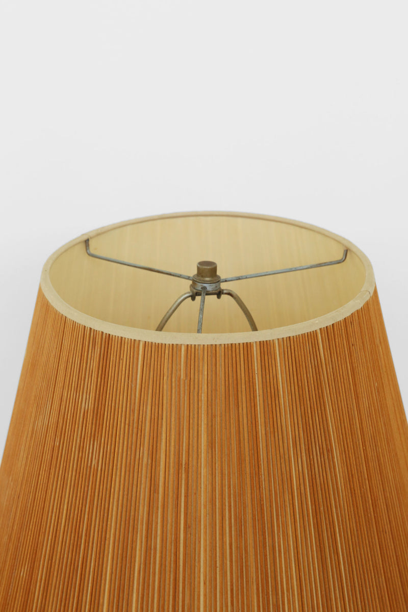 Pleated orange lampshade detail of Scandi floor lamp