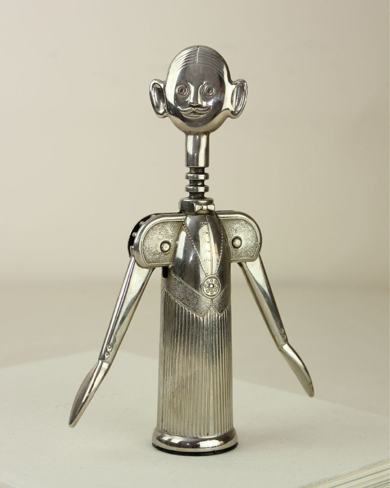 Silver anthropomorphic corkscrew by Aldo Columbo with face design