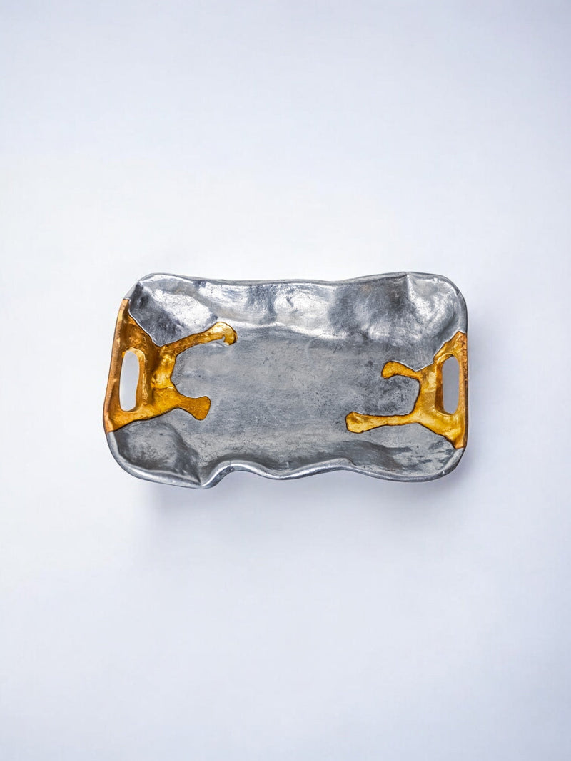 Brutalist silver-gold vide-poche with organic sculptural form