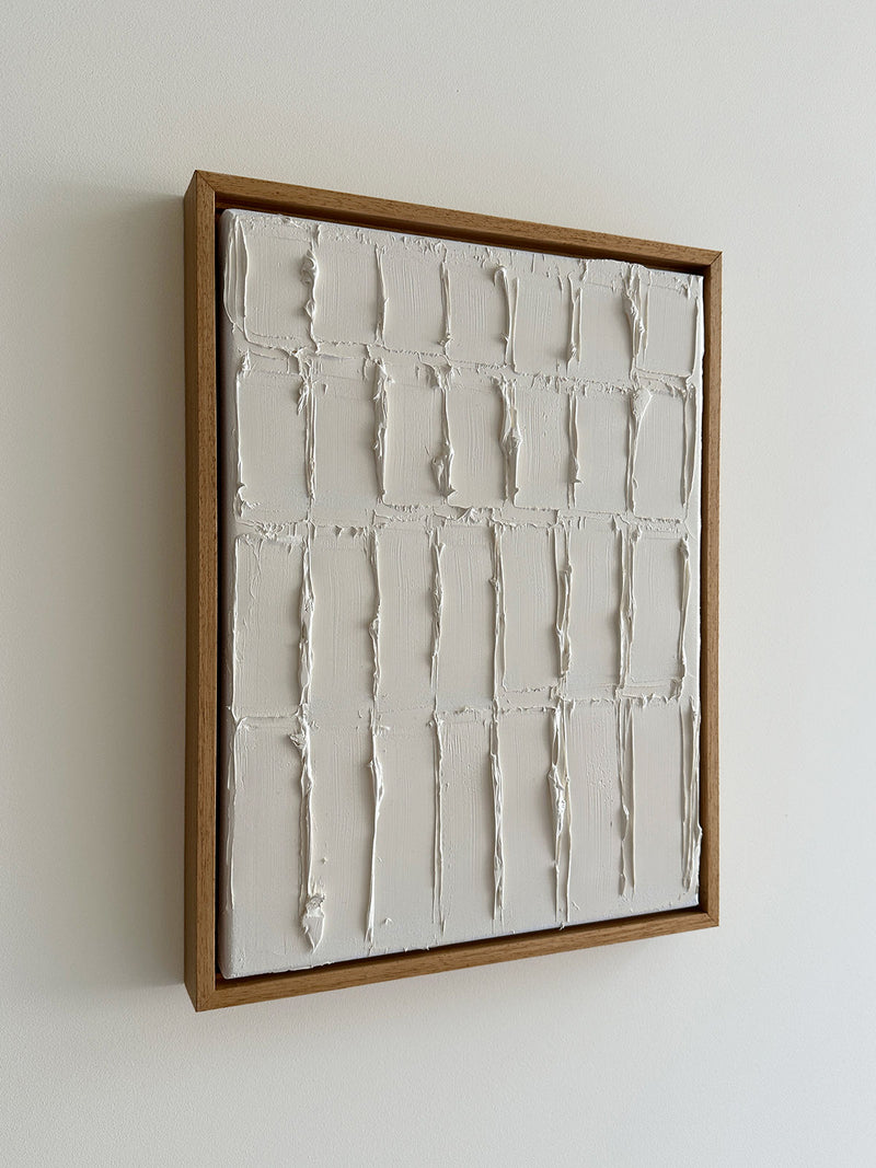 Heavy texture white paint grid pattern in wooden frame by Roi Elmaliah