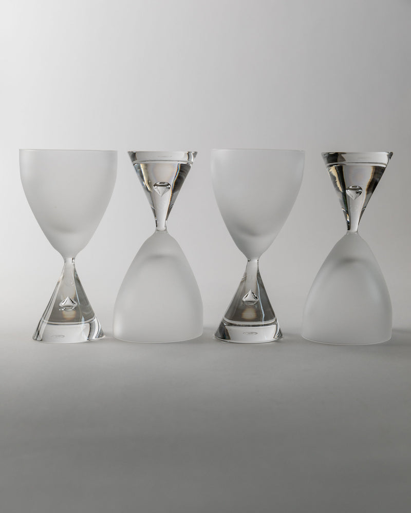 Set of four elegant Murano glass hourglasses with metallic accents