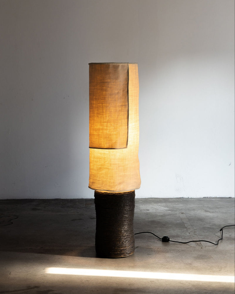 Lazo floor lamp with illuminated fabric shade and textured base