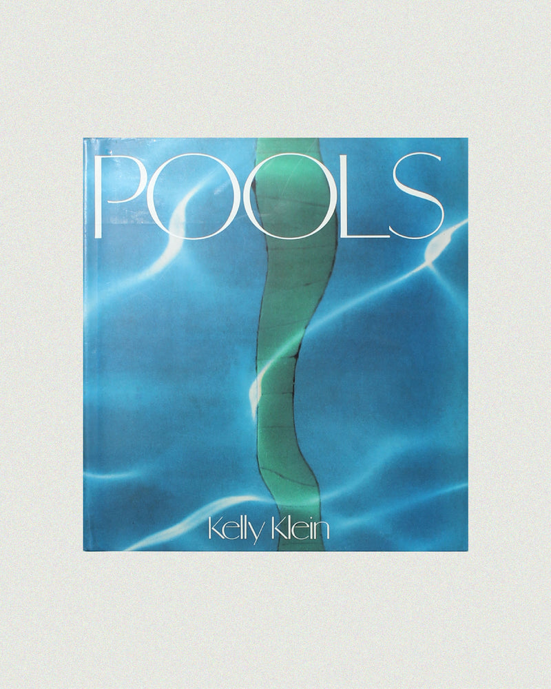 Pools photography book by Kelly Klein with blue water cover