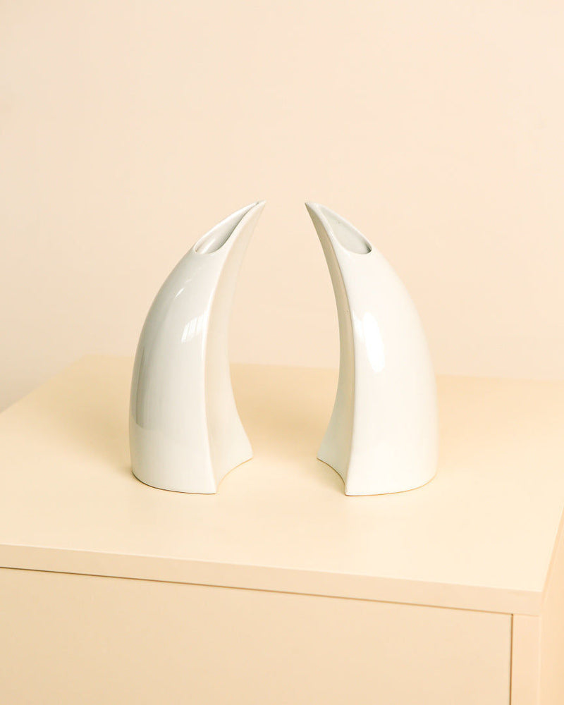 Pair of white ceramic curved vases, 1980s Italian design