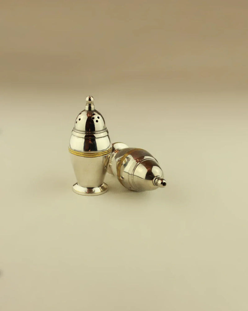 
Art Deco Salt and Pepper set, crafted from high-quality materials, sleek and modern design, adds a touch of sophistication to your dining experience