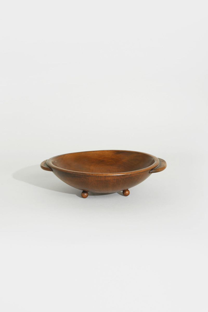 Handcrafted wooden bowl with handles and ball feet by Villa