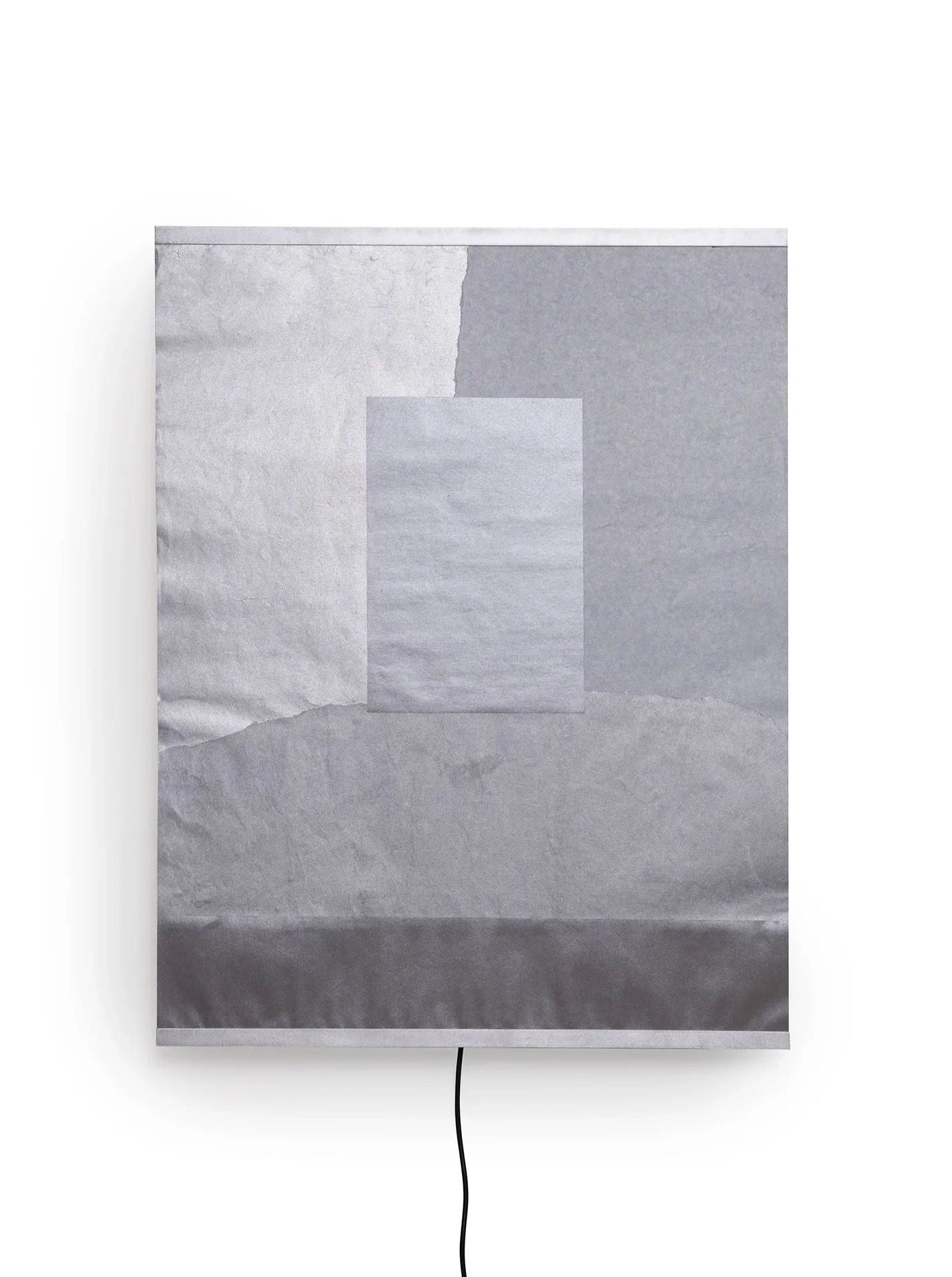 The TEGET Panel Wall Lamp titled "Icescape" is a modern, minimalist wall art piece that showcases layers of textured gray and white panels featuring a central square. Its black power cord elegantly hangs from the bottom, emphasizing its dual functionality as both a light fixture and an artistic installation.