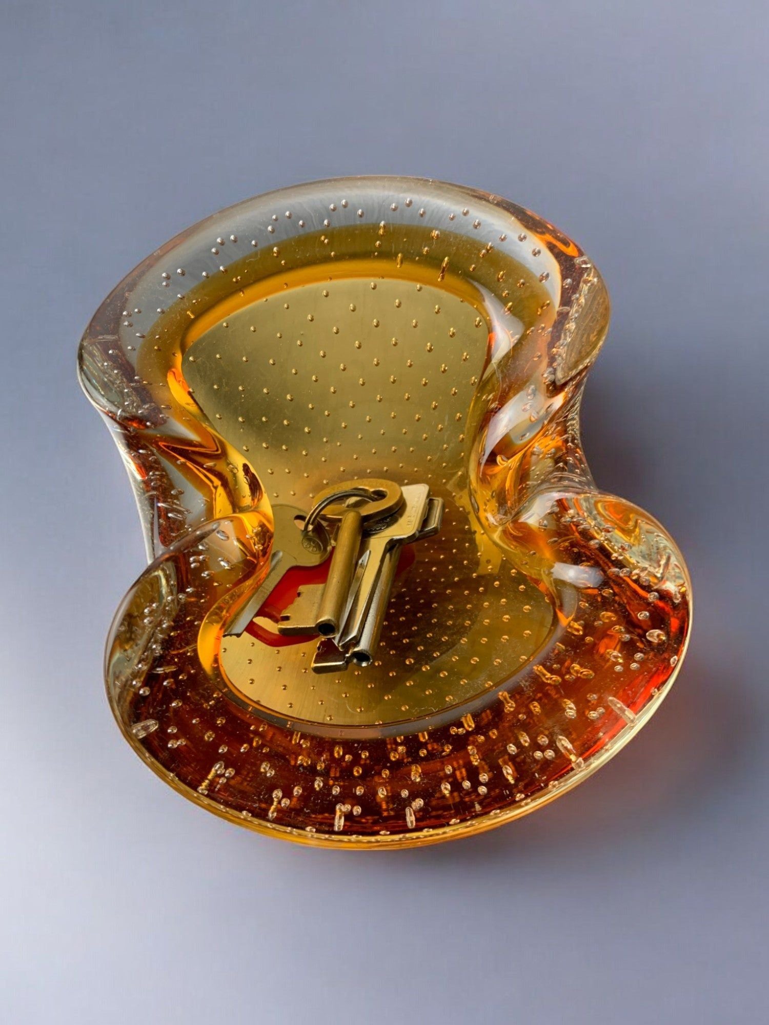 Seguso Murano glass vide-poche detail showing amber bubbled texture