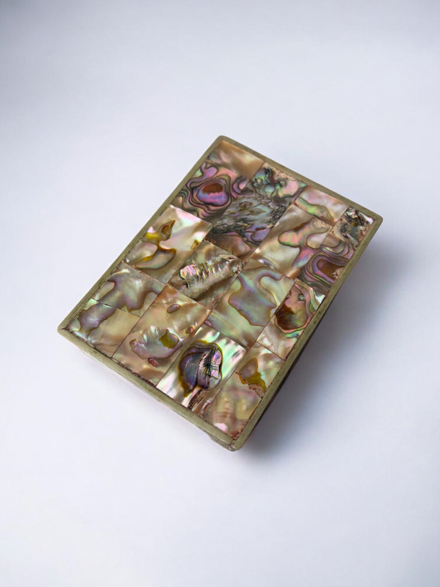Abalone shell vanity box showing intricate inlay pattern detail