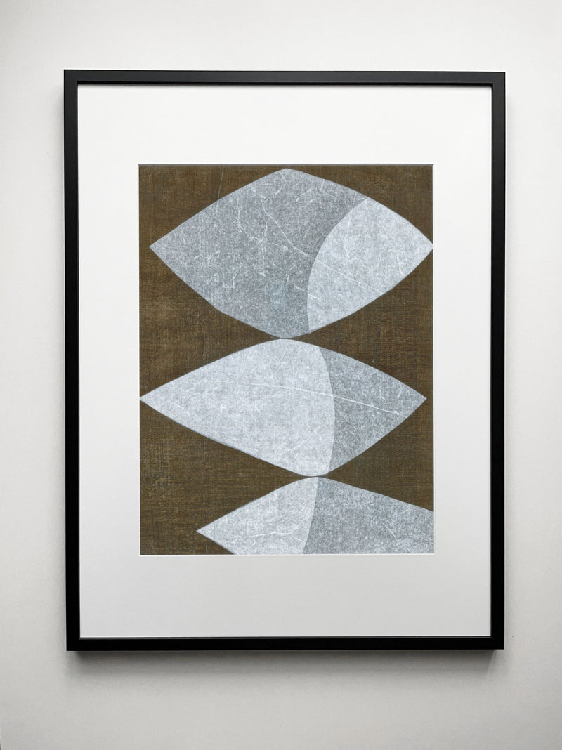 Wind Touch mixed media drawing with three geometric diamond shapes on brown background