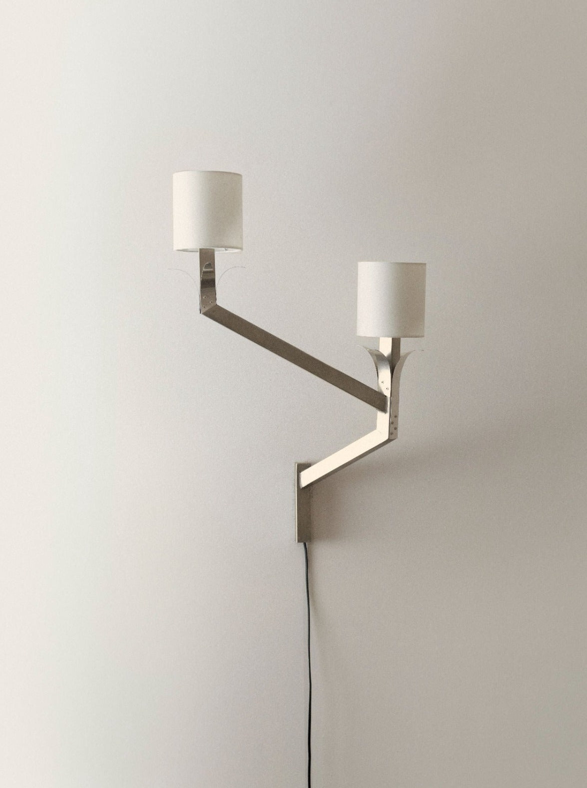 Stainless wall lamp 02 illuminates outdoor spaces with modern elegance