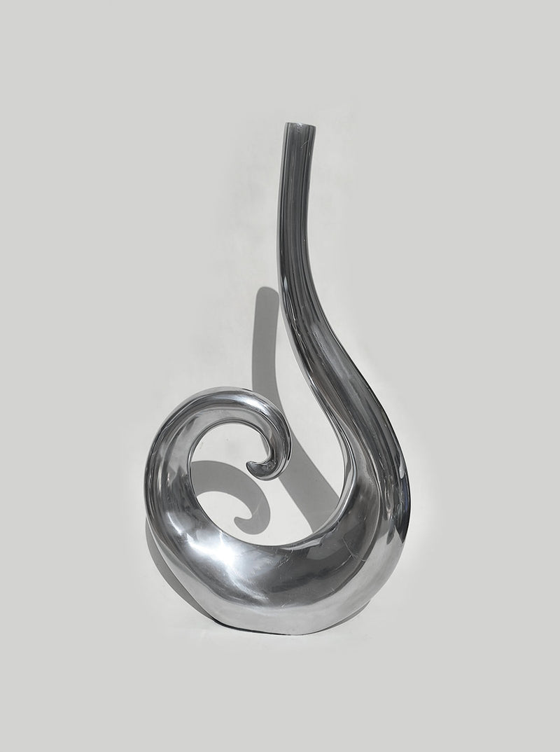 Modern gray glass spiral vase with curved flowing design by Les Objoies