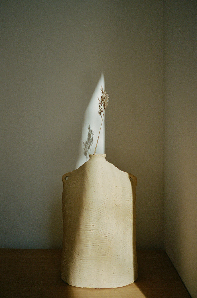 Niwa ceramic vase with dried grass stems by ATELIER1991