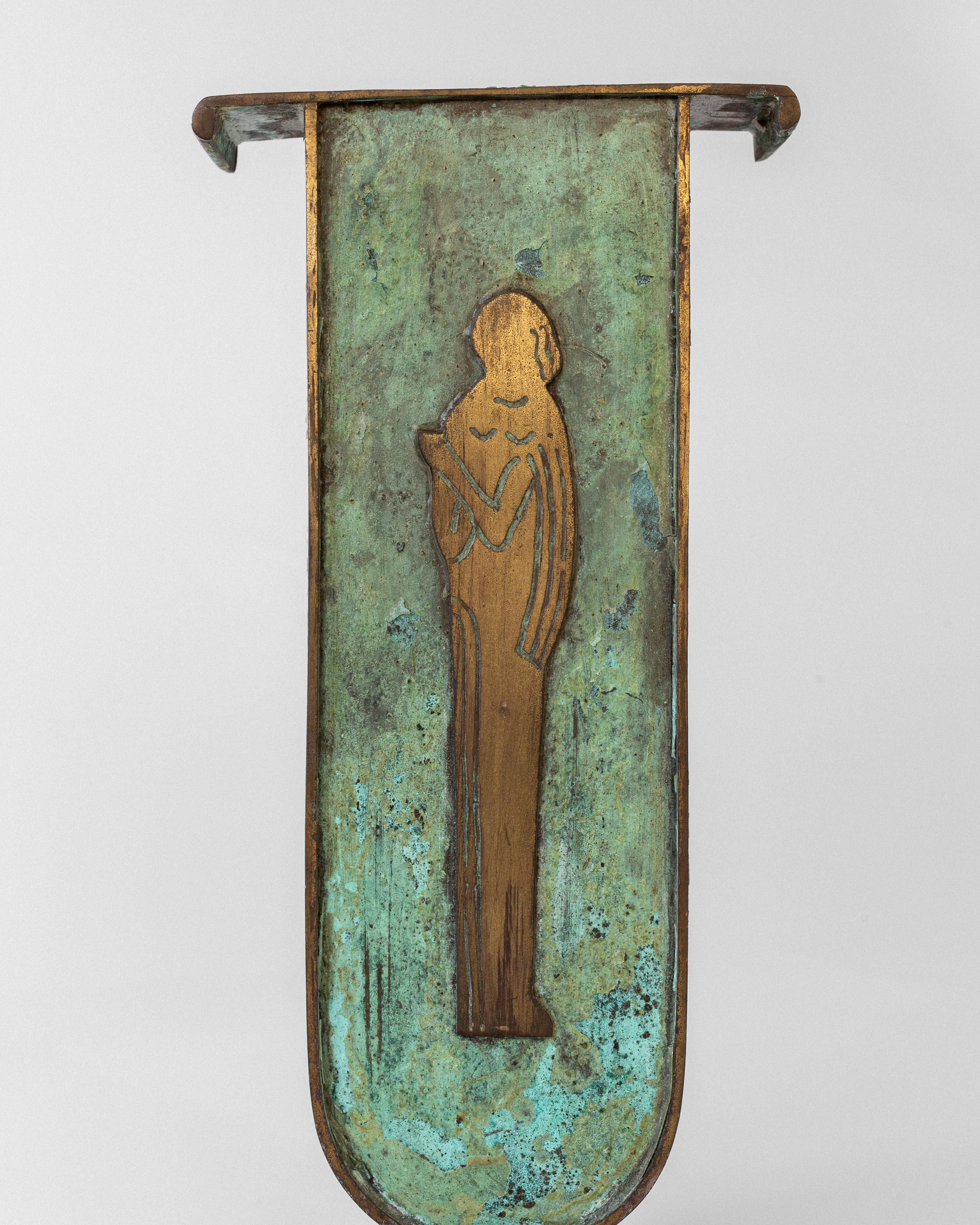 Spigel's Art Deco Brass Vase showcases a verdigris patina with oxidized blue hues. Its vertical design and rectangular shape feature slightly curved corners, reminiscent of Swedish style.