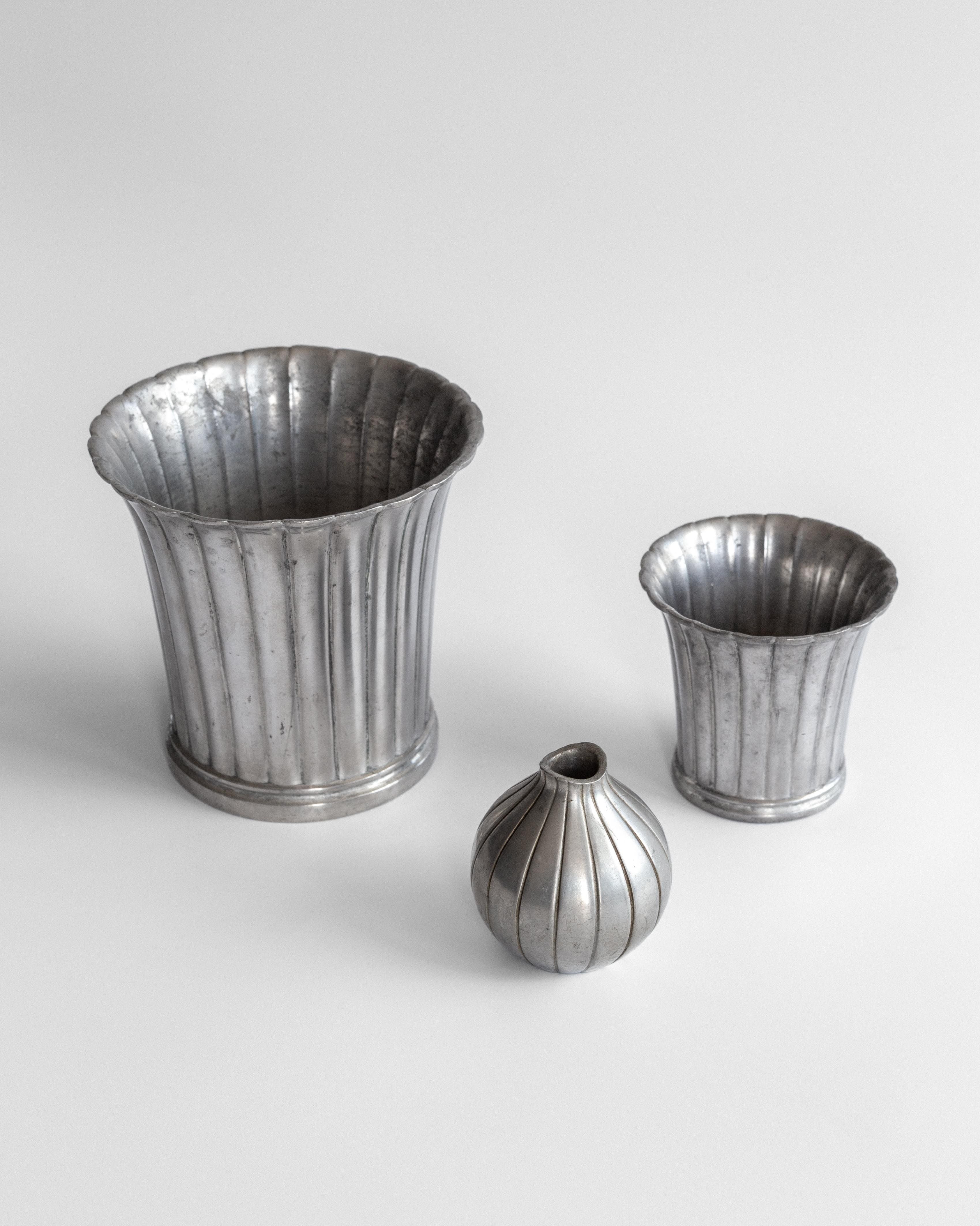 Three Just Andersen pewter vases 1930s with ribbed fluted design