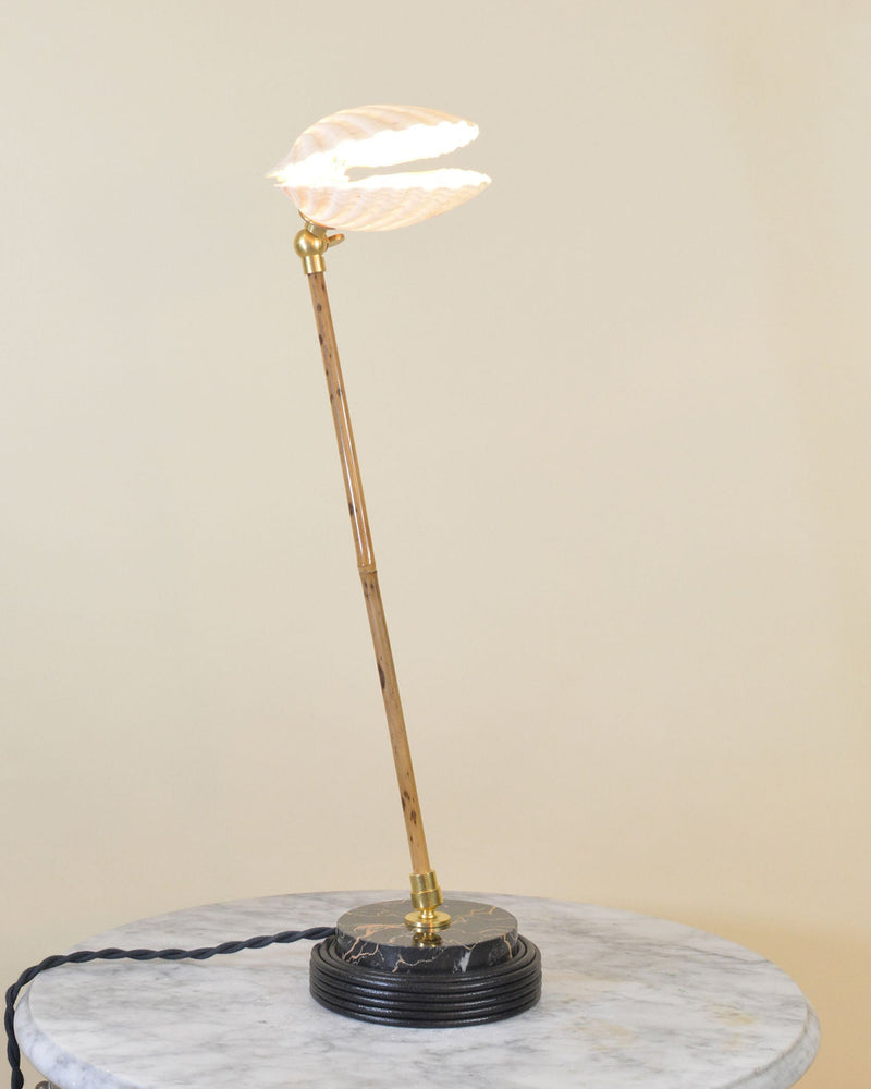 Sanremo bamboo reading lamp with shell shade on marble table