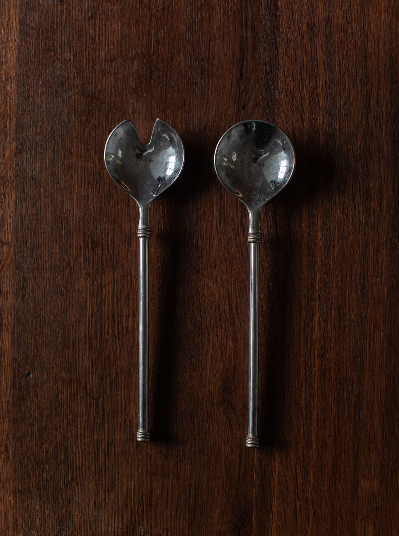 Art-Deco-inspired stainless steel cutlery set with geometric handles and sleek design