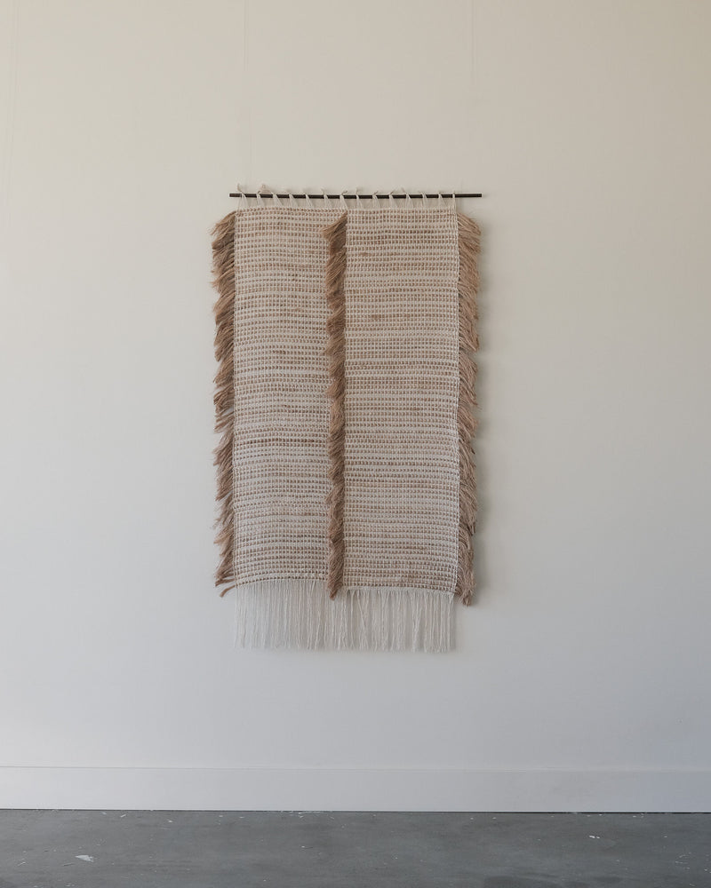 Ripple woven wall sculpture with natural fibers and fringe
