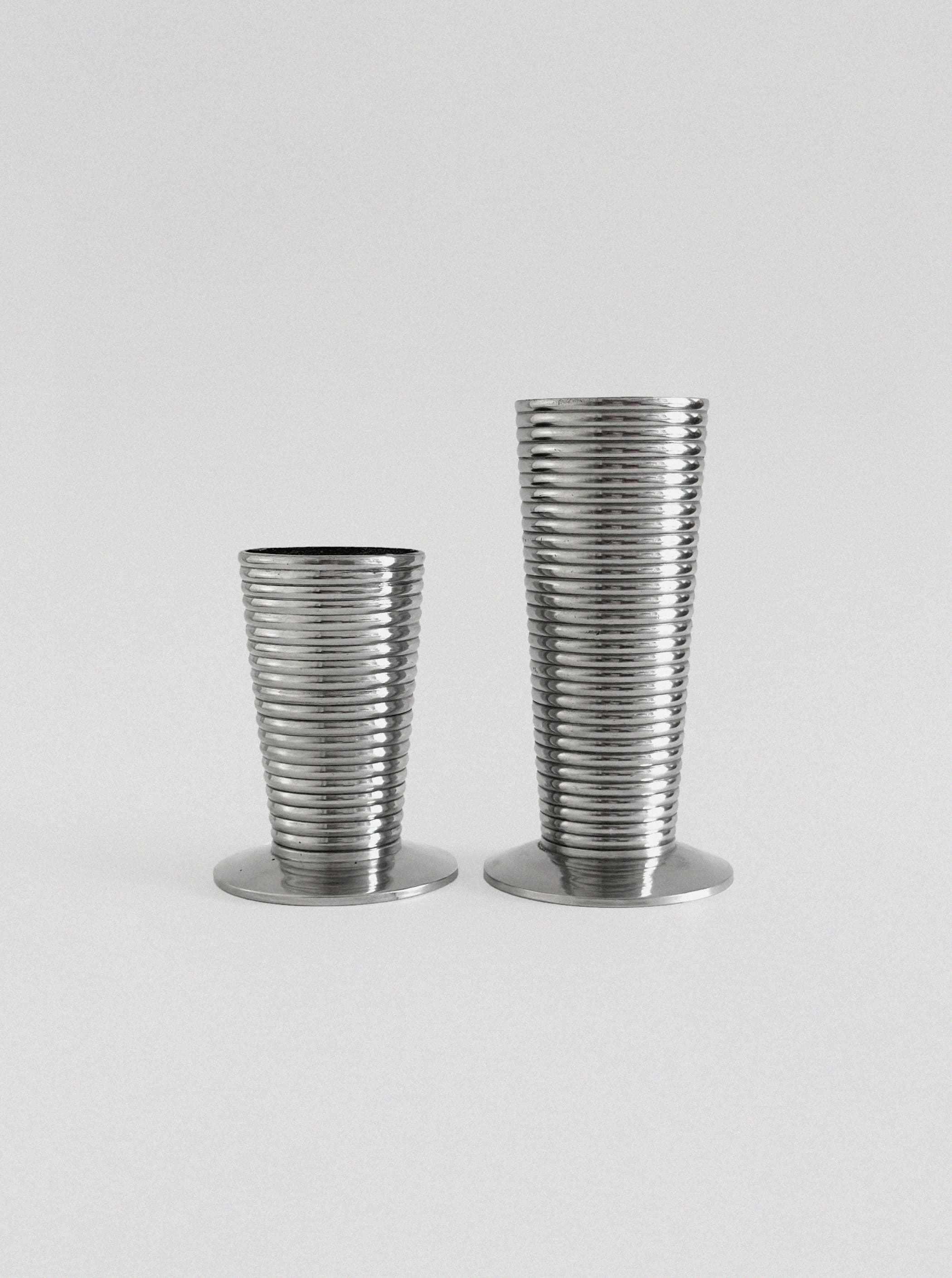 Pair of Aluminum Vases