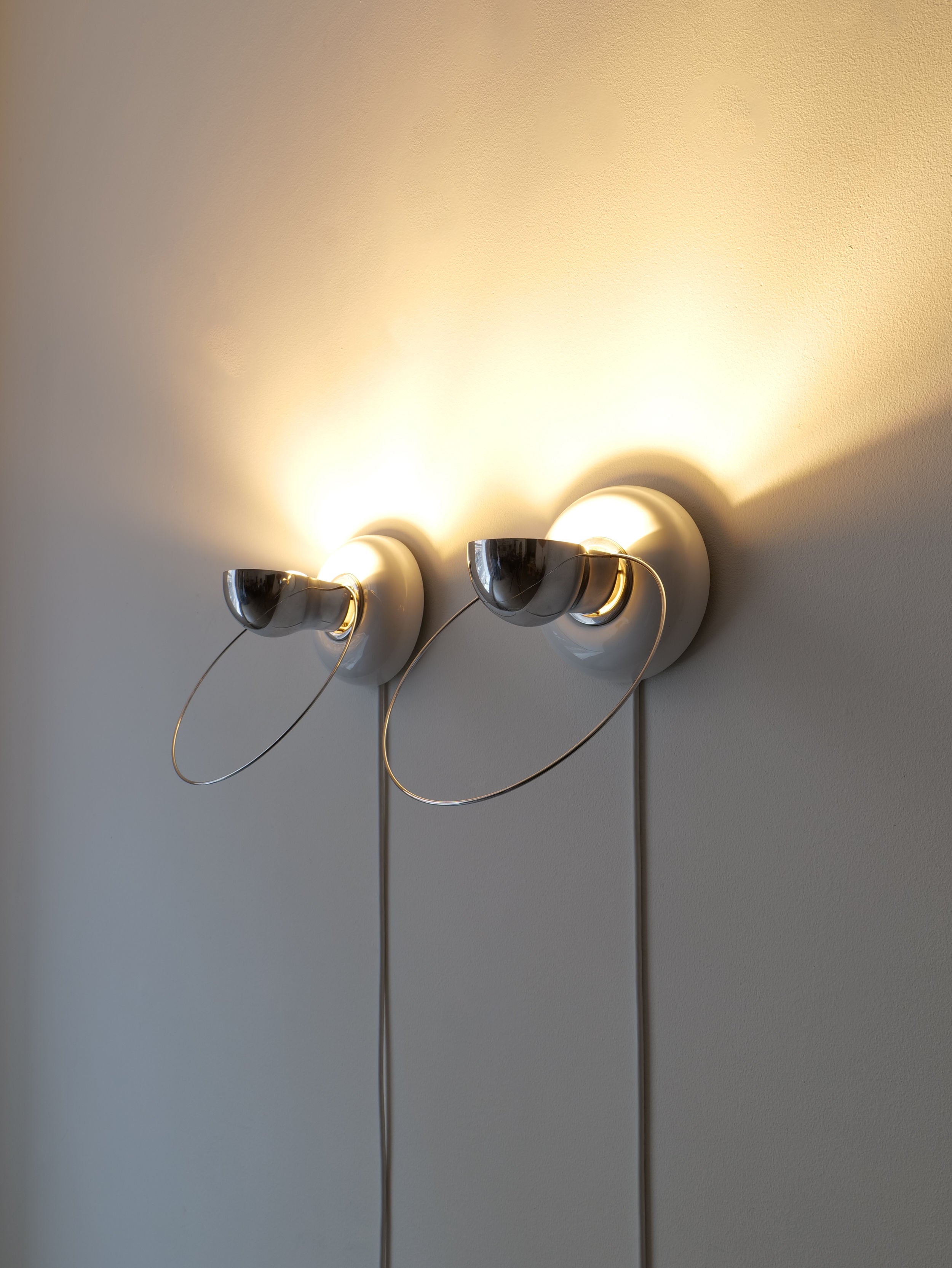 Bisbi Wall Sconces designed by Achille Castiglioni to elevate any space