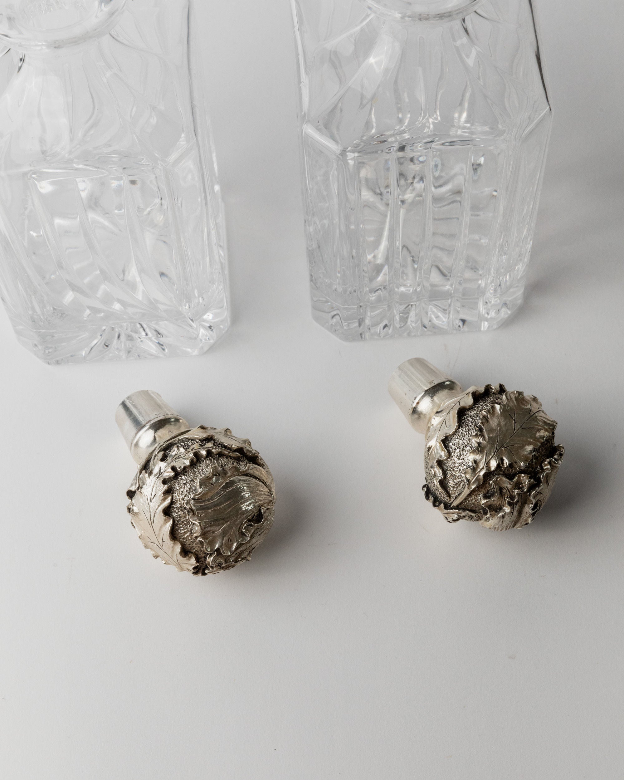 Ornate silver stoppers detail of Italian crystal decanters 1950s