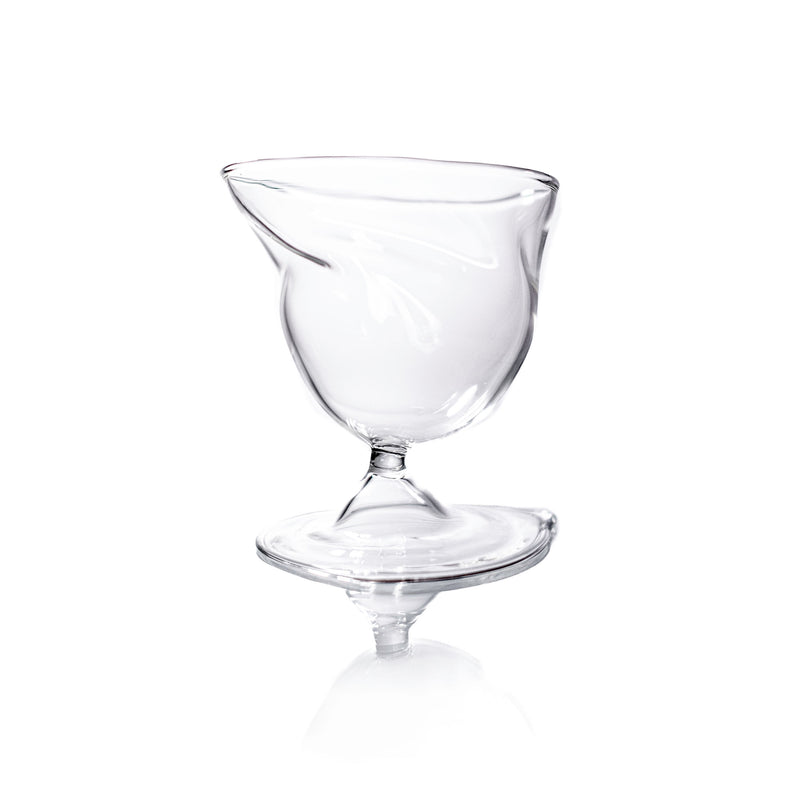 Clear glass brandy snifter with curved bowl and stem detail