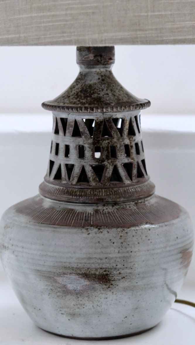 Ceramic table lamp base detail showing perforated geometric shade from Vallauris